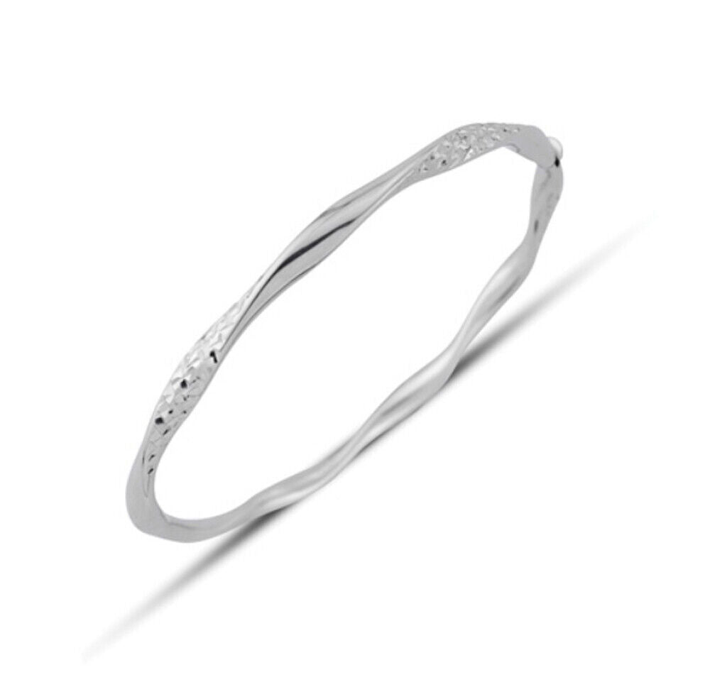 White Gold Twisted Bangle Modern Hinged Hallmarked British Made Ladies Bracelet