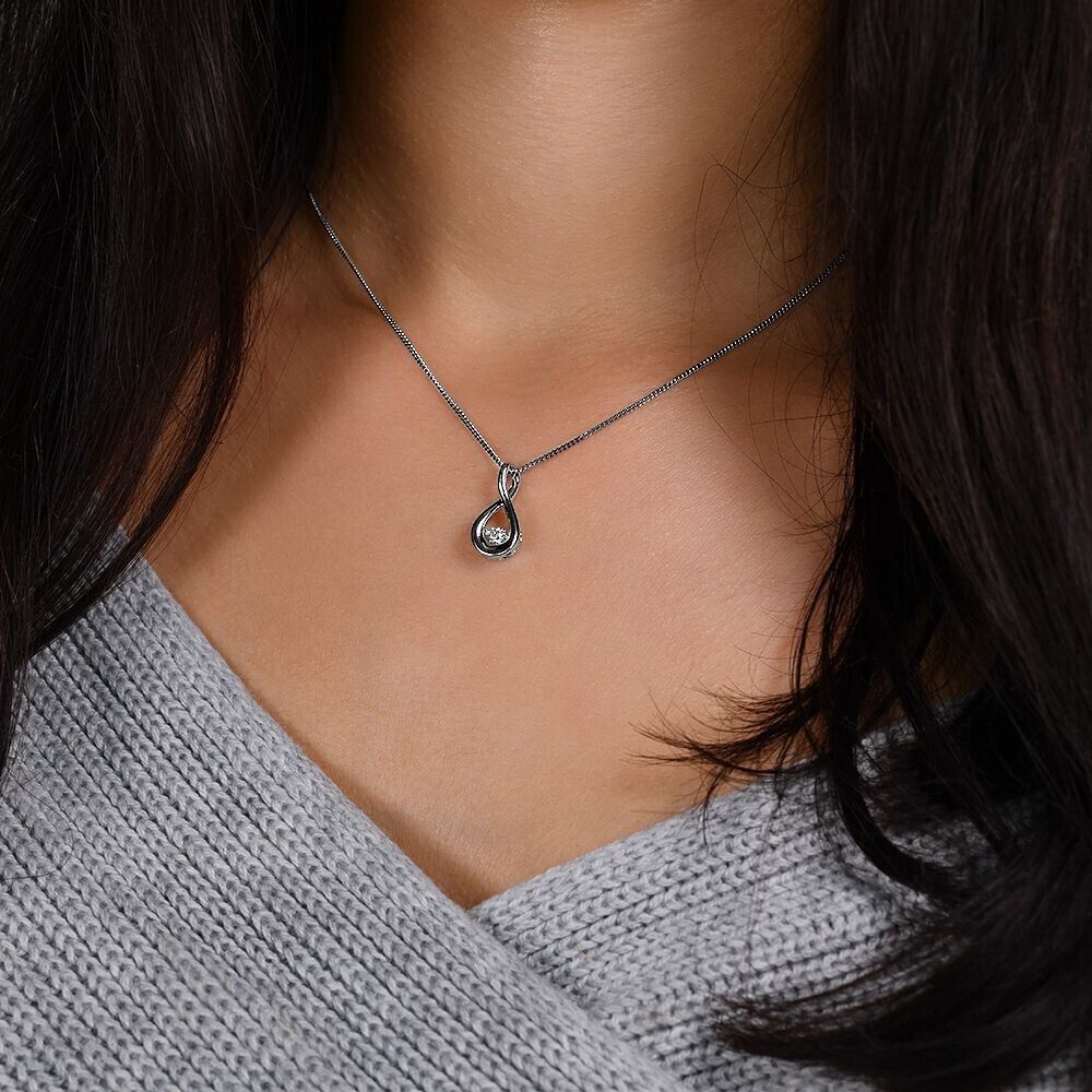 9ct White Gold 0.10ct Dancing Diamond Drop Pendant and 18" Chain