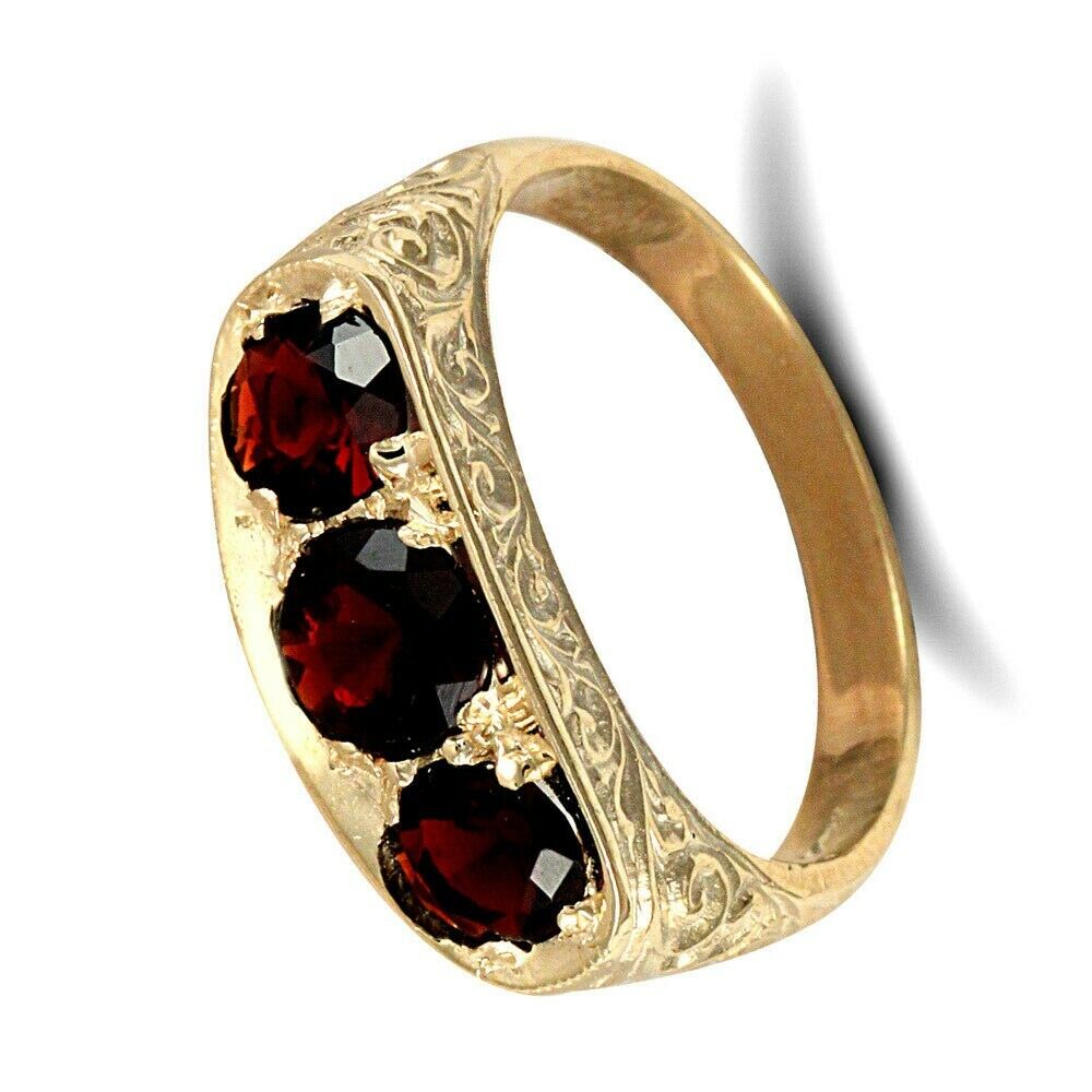 9ct gold gents garnet ring with three deep red garnet stones and intricate engraved detailing