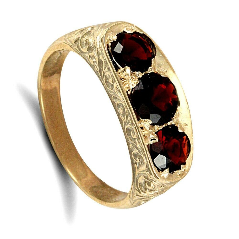 9ct gold gents garnet ring with three deep red garnet stones and intricate engraved band design