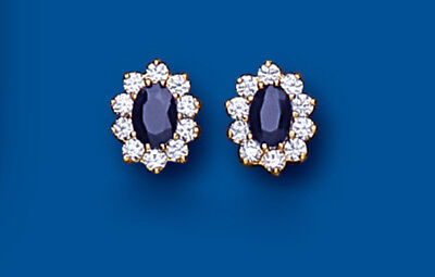 J R Jewellery 9ct gold sapphire stud earrings with oval blue sapphires surrounded by white stones