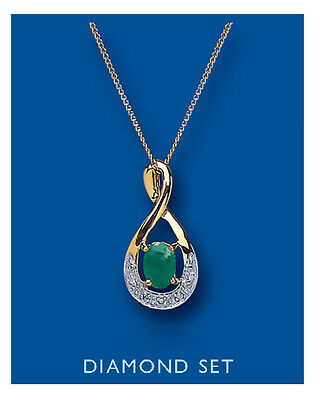 Elegant emerald and diamond pendant with gold setting and delicate chain by J R Jewellery