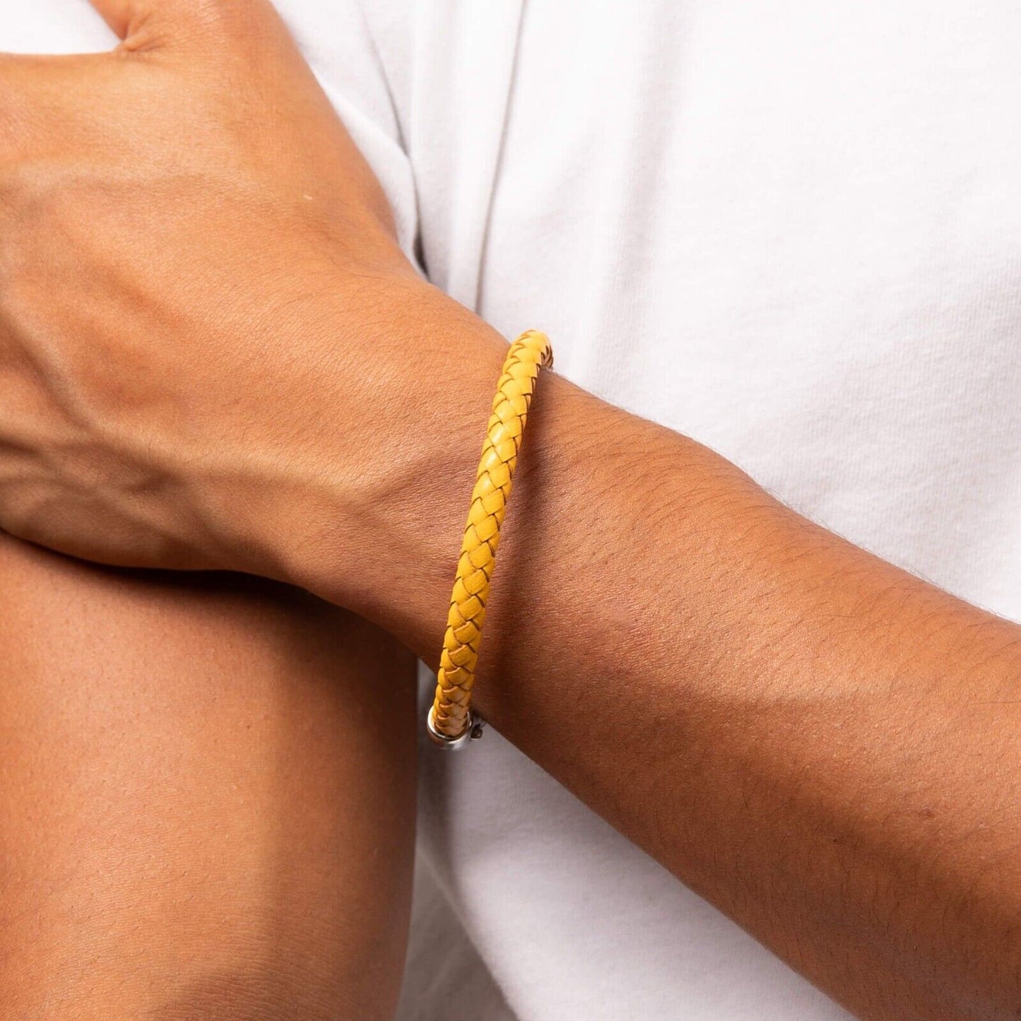 Fred Bennett mustard yellow bracelet braided leather design worn on wrist