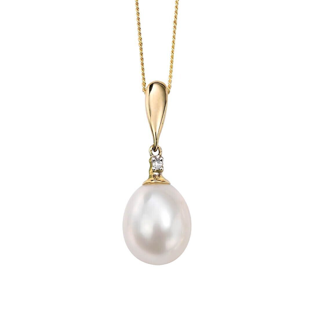 Elegant freshwater pearl and diamond pendant set with gold chain by J R Jewellery