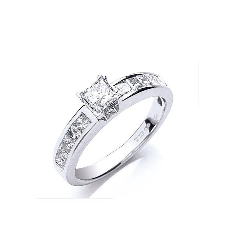 Elegant princess cut diamond ring 18ct white gold with channel-set side stones by J R Jewellery