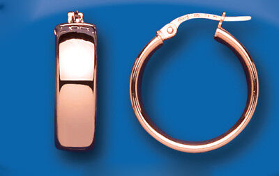 J R Jewellery rose gold hoop earrings with polished finish on blue background