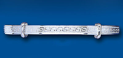 J R Jewellery solid silver child’s bangle with Greek key engraving and hinged clasp on blue background