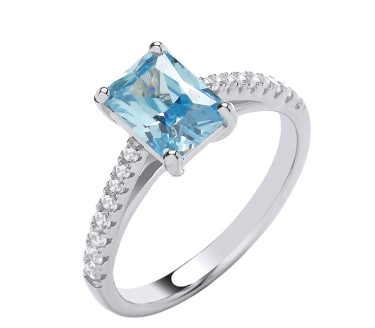 J R Jewellery sterling silver blue topaz ring with emerald cut topaz and pave diamond shoulders