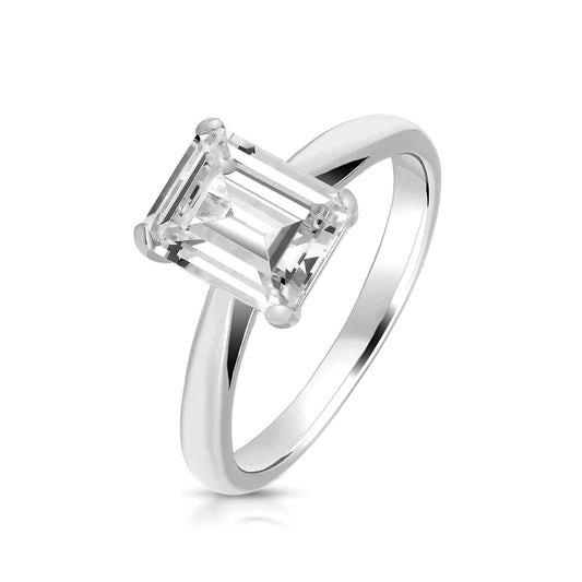 Elegant sterling silver emerald cut solitaire ring with a sleek polished band by J R Jewellery