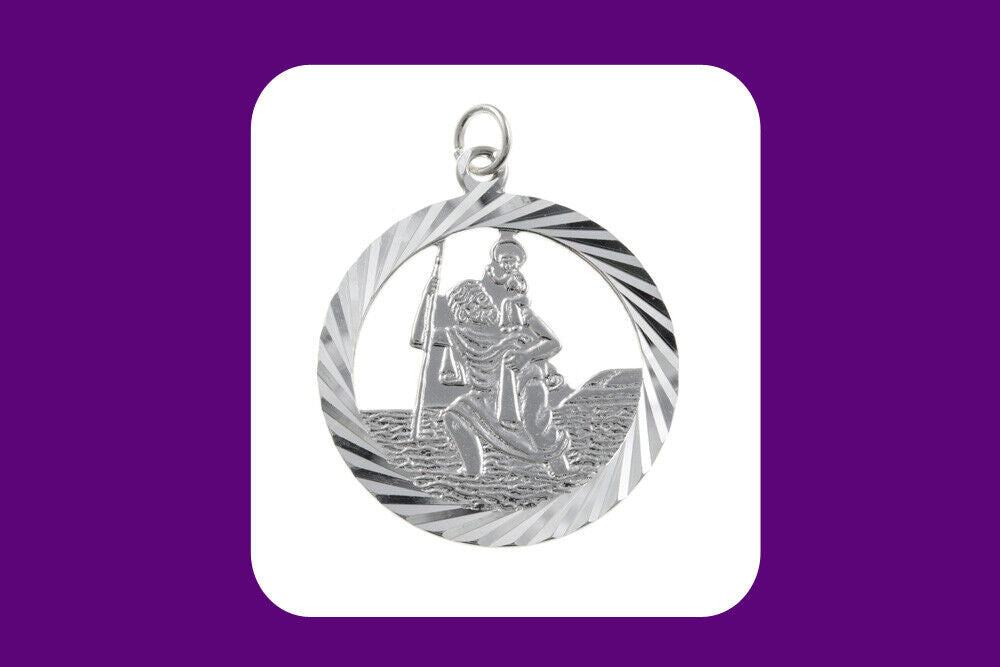 Detailed sterling silver St Christopher pendant featuring a figure carrying a child across water