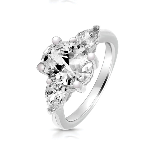 J R Jewellery sterling silver trilogy ring featuring a large central round stone with two pear-shaped side stones