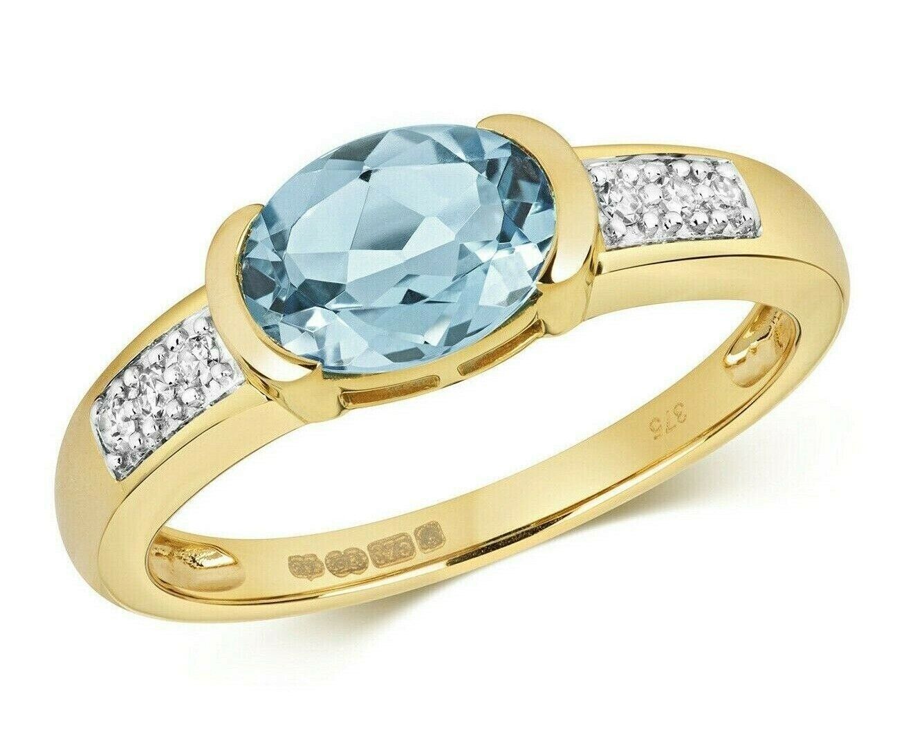 Gold ring featuring a large oval Swiss blue topaz diamond ring with diamond accents on the band