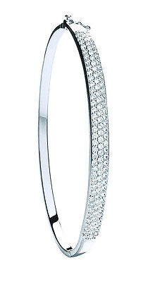 J R Jewellery 9ct white gold ladies bangle slim oval design with triple row pave set sparkling stones