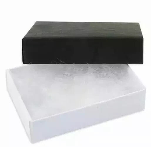 Black and white jewellery box with soft padding, ideal for sterling silver ruby heart ring presentation
