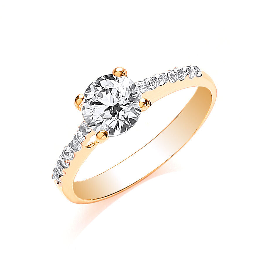 J R Jewellery yellow gold single stone ring with a central round diamond and smaller side diamonds