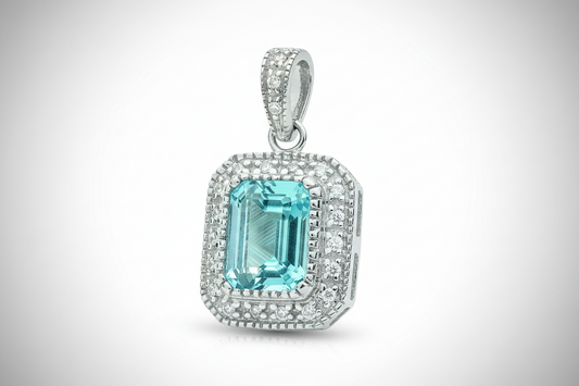 9ct White Gold 0.10ct Diamond & 1.95ct Blue Topaz Pendant