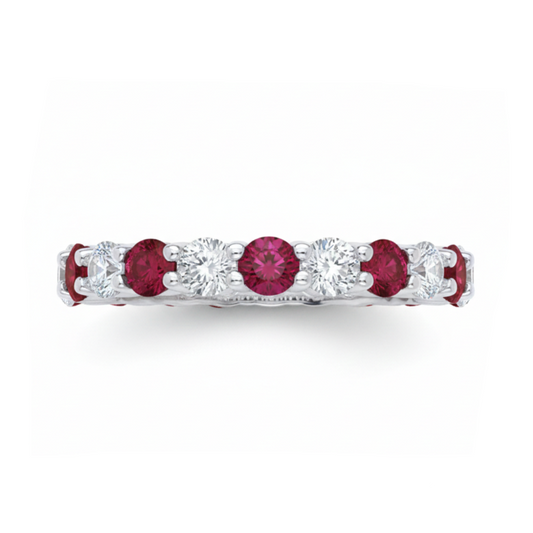 Eternity ring with red gemstones and diamonds on a white background