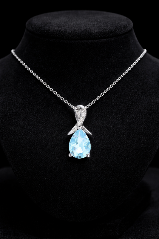 9ct White Gold Blue Topaz Pendant With Diamond Kiss 18" 46cm Length Chain