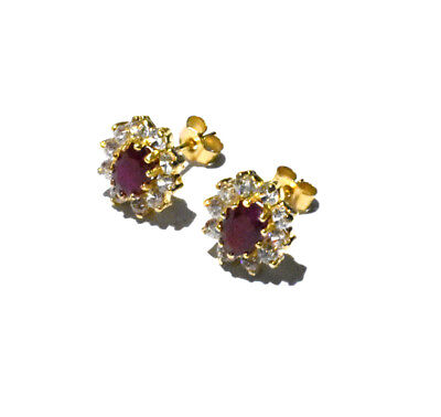 9ct gold ruby stud earrings surrounded by sparkling gemstones for a classic look