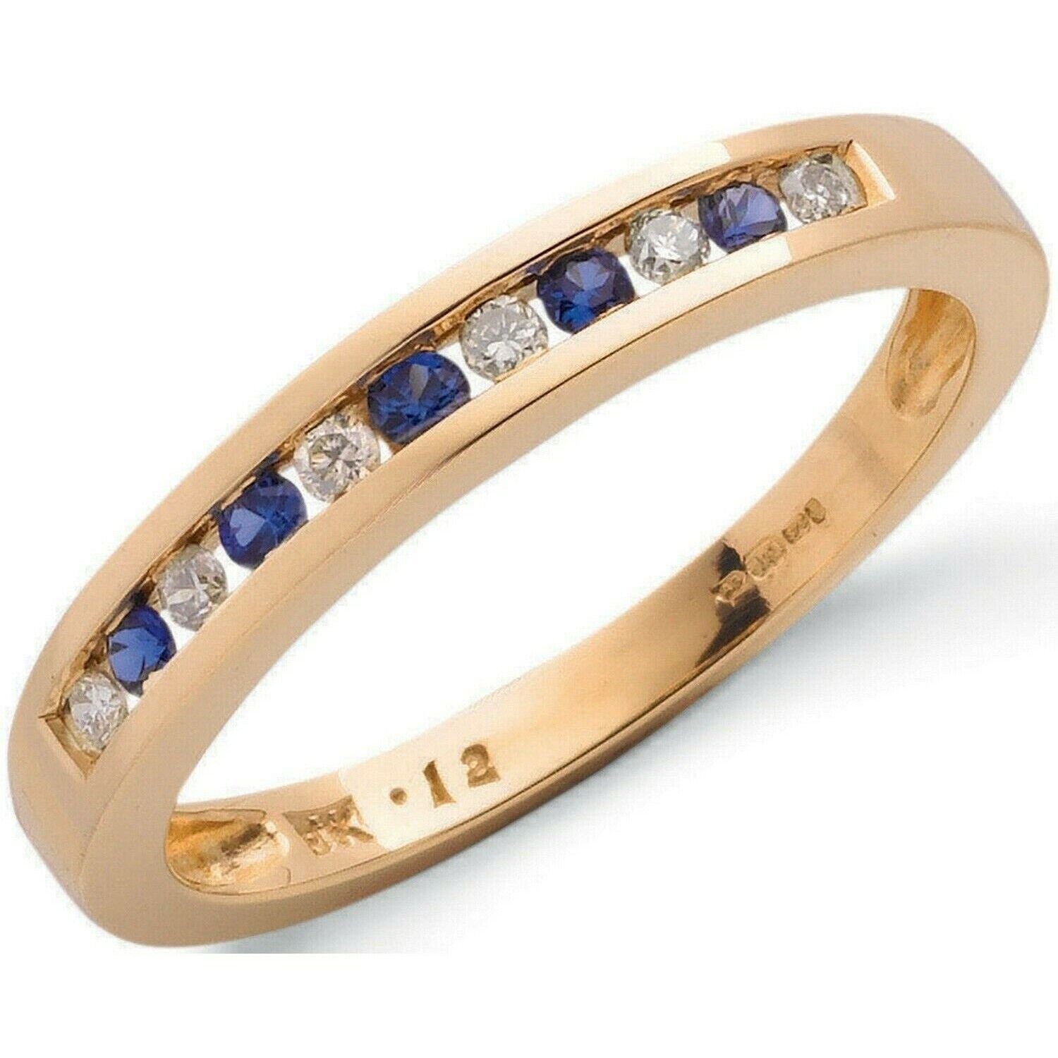 gold sapphire and diamond eternity ring featuring alternating blue sapphires and sparkling diamonds