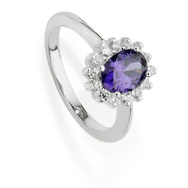 Amethyst cluster ring sterling silver featuring an oval amethyst stone and sparkling accents