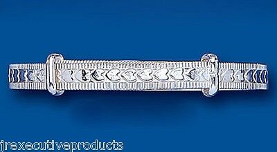 Elegant silver baby bangle with heart designs and smooth polished finish by J R Jewellery