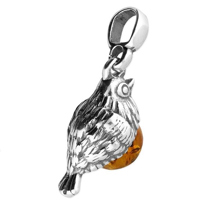 Cognac amber robin pendant designed by J R Jewellery with detailed silver bird accent