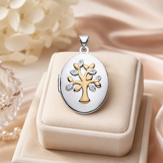 Elegant Two-Tone Tree Of Life Oval Locket displayed on a velvet jewellery box