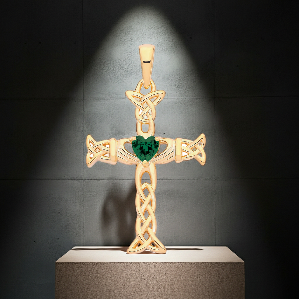 Gold Emerald Claddagh Celtic Cross with intricate knotwork and a heart-shaped emerald centre