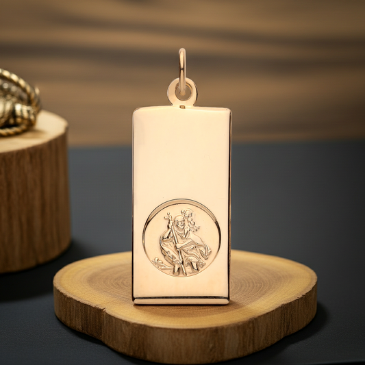 Gold St Christopher Ingot Pendant featuring intricate detailing on a smooth surface for protection