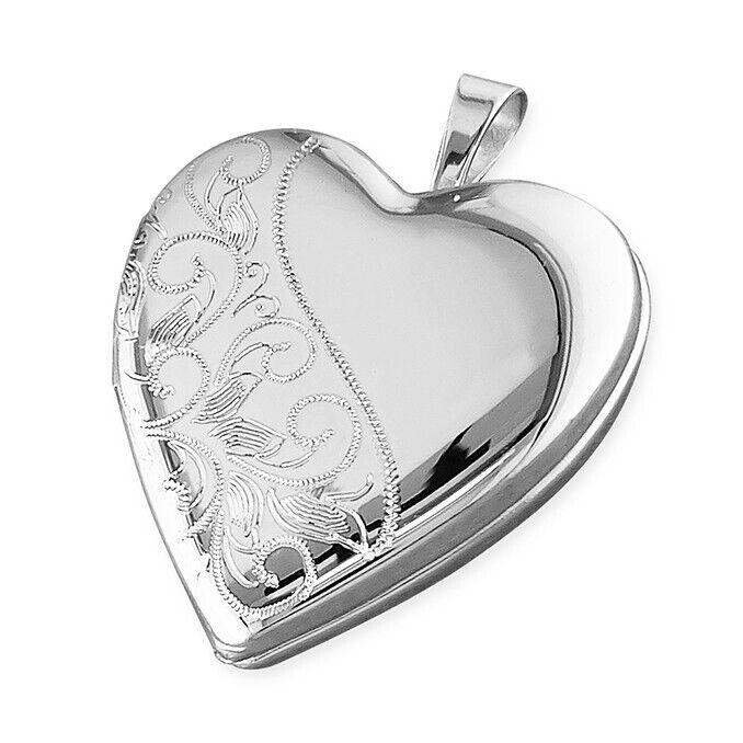 Heart Locket With Leaf Pattern in polished silver, featuring intricate engravings and a classic design