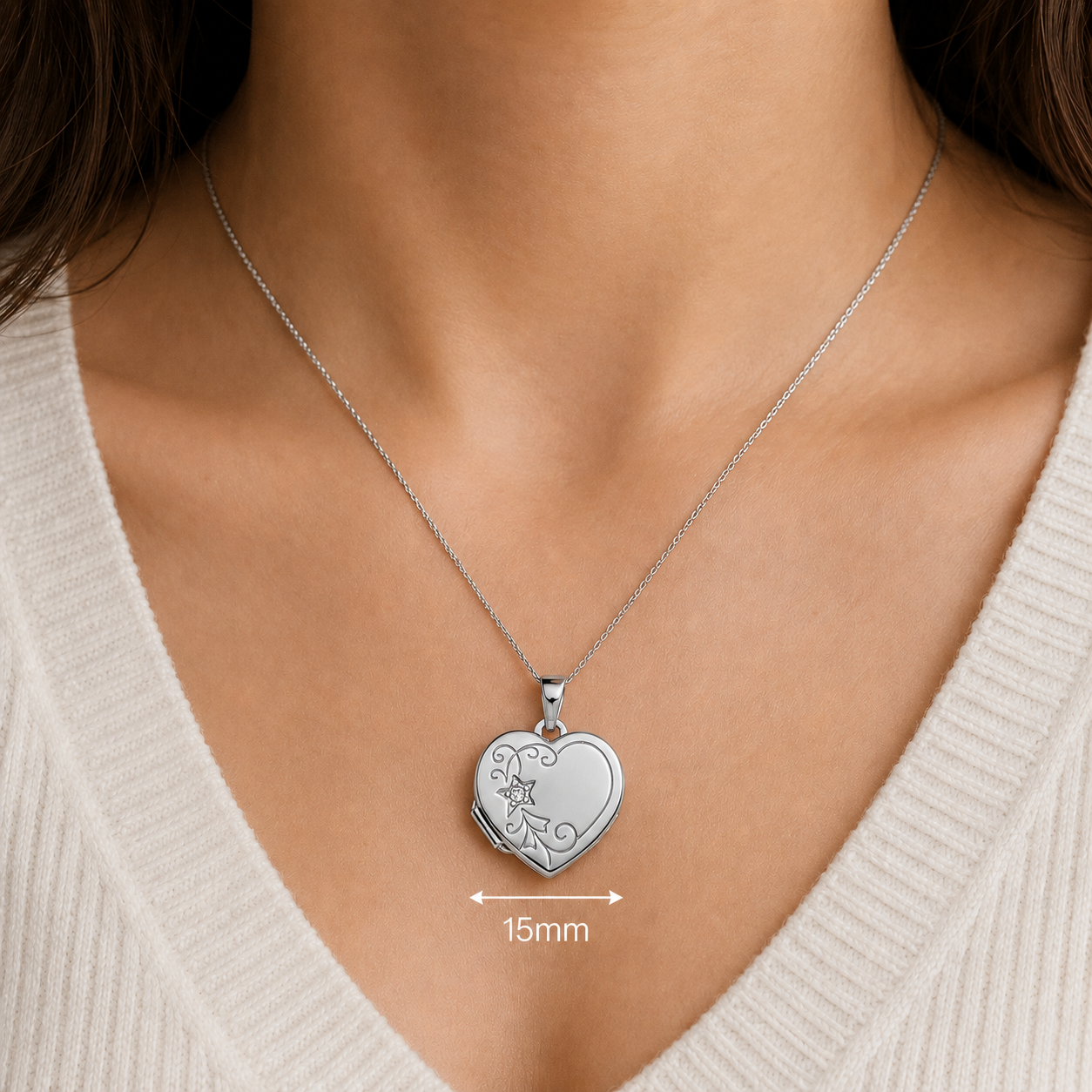 Silver Heart Shaped Floral Locket on a delicate chain, measuring 15mm, perfect for keepsakes