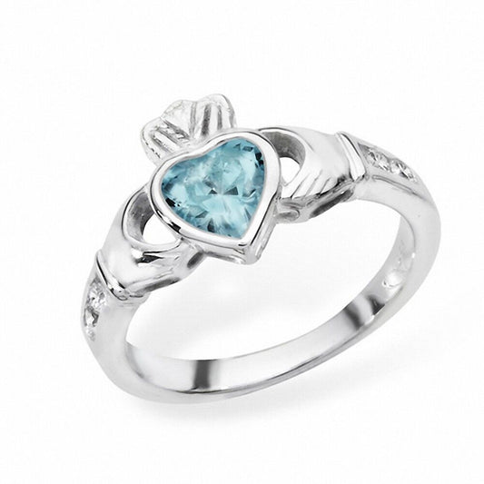 Elegant Irish Claddagh Ring with a Heart-Shaped Blue Stone and Silver Design