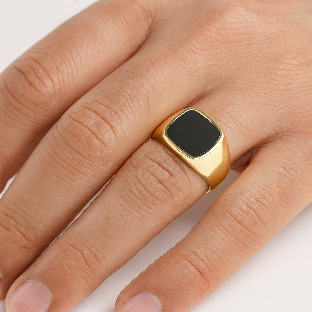 Mens Black Onyx Signet Ring with a polished gold band for a sophisticated look