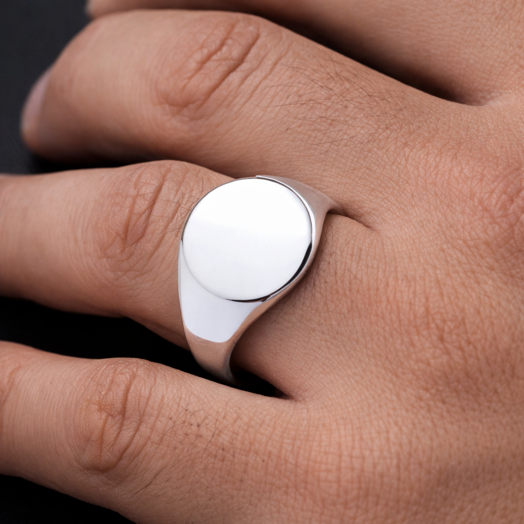 Stylish Mens Oval Signet Ring in polished silver, perfect for everyday wear.