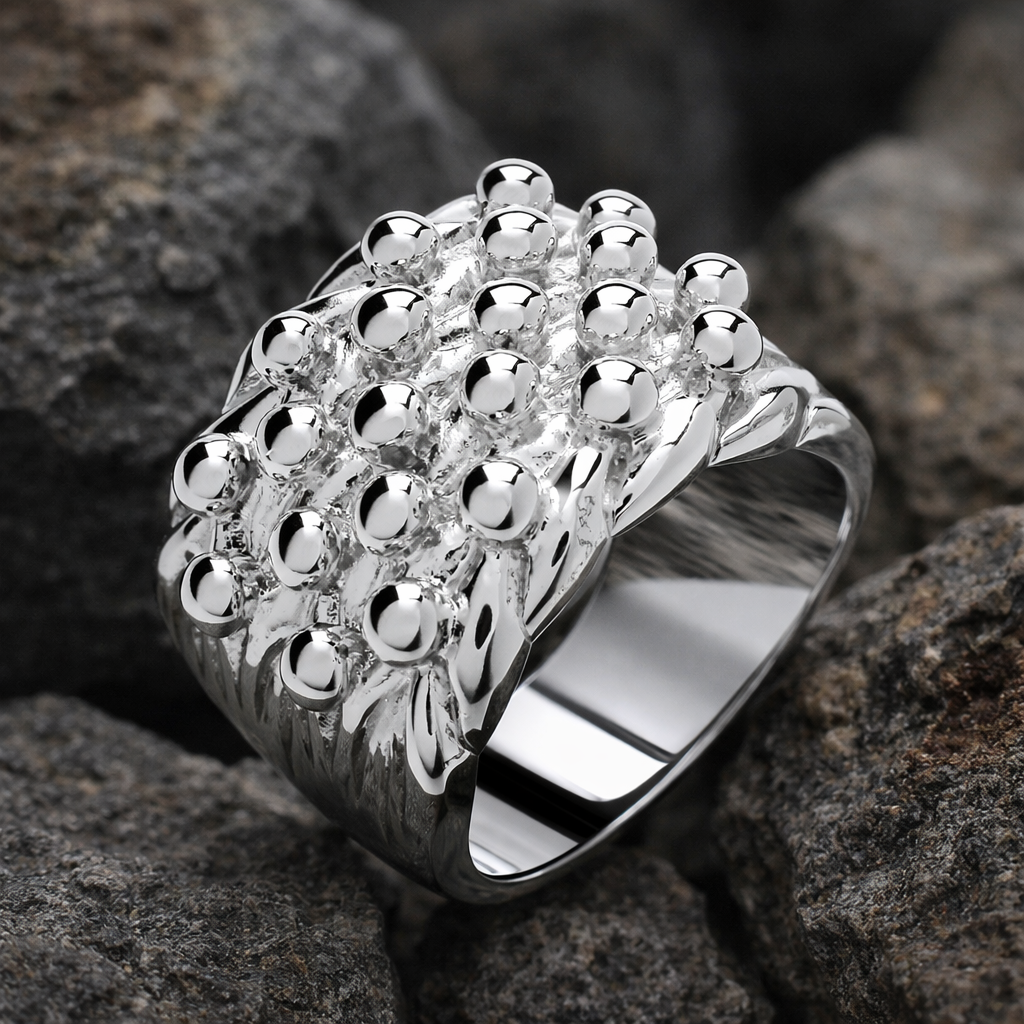 Stylish mens ring by J R Jewellery, featuring a textured silver design with polished details