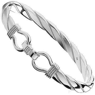 Stylish mens sterling silver stirrup bangle with a twisted design and secure clasp