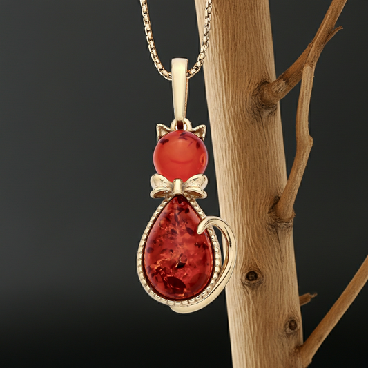 Silver necklace featuring a pendant amber design with a cat motif and intricate detailing