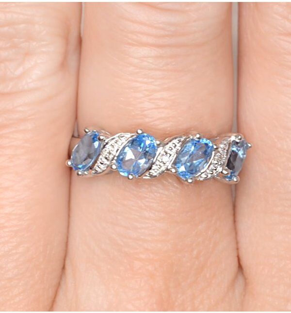Real Blue Topaz And Diamond Eternity Ring in Silver with Elegant Design and Sparkling Stones