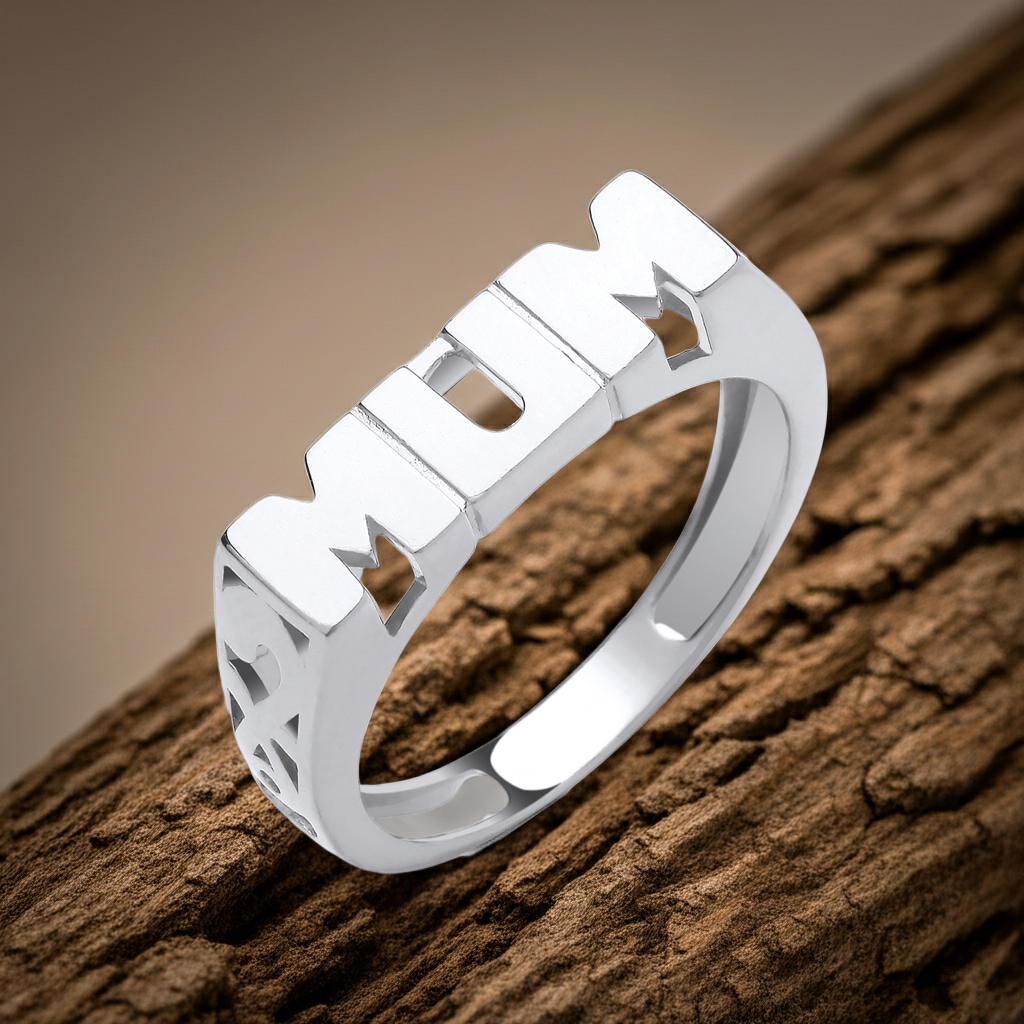 Solid sterling silver mum ring with a bold letter design presented on a wooden surface