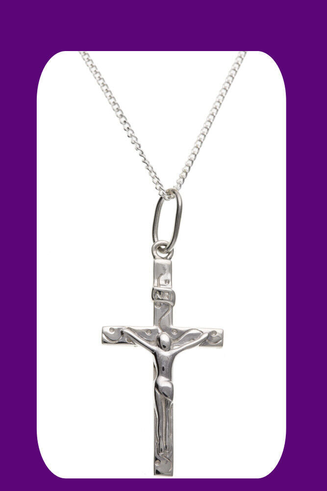 Sterling Silver Plain Crucifix Cross Pendant on a silver chain, perfect for everyday wear.