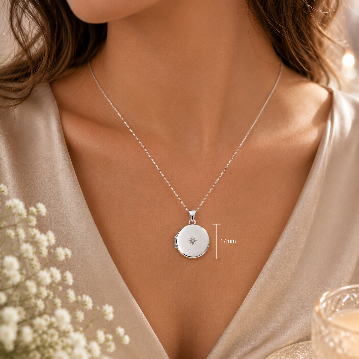 Sterling Silver Round Locket worn on a chain, measuring 17mm in diameter, with a floral design