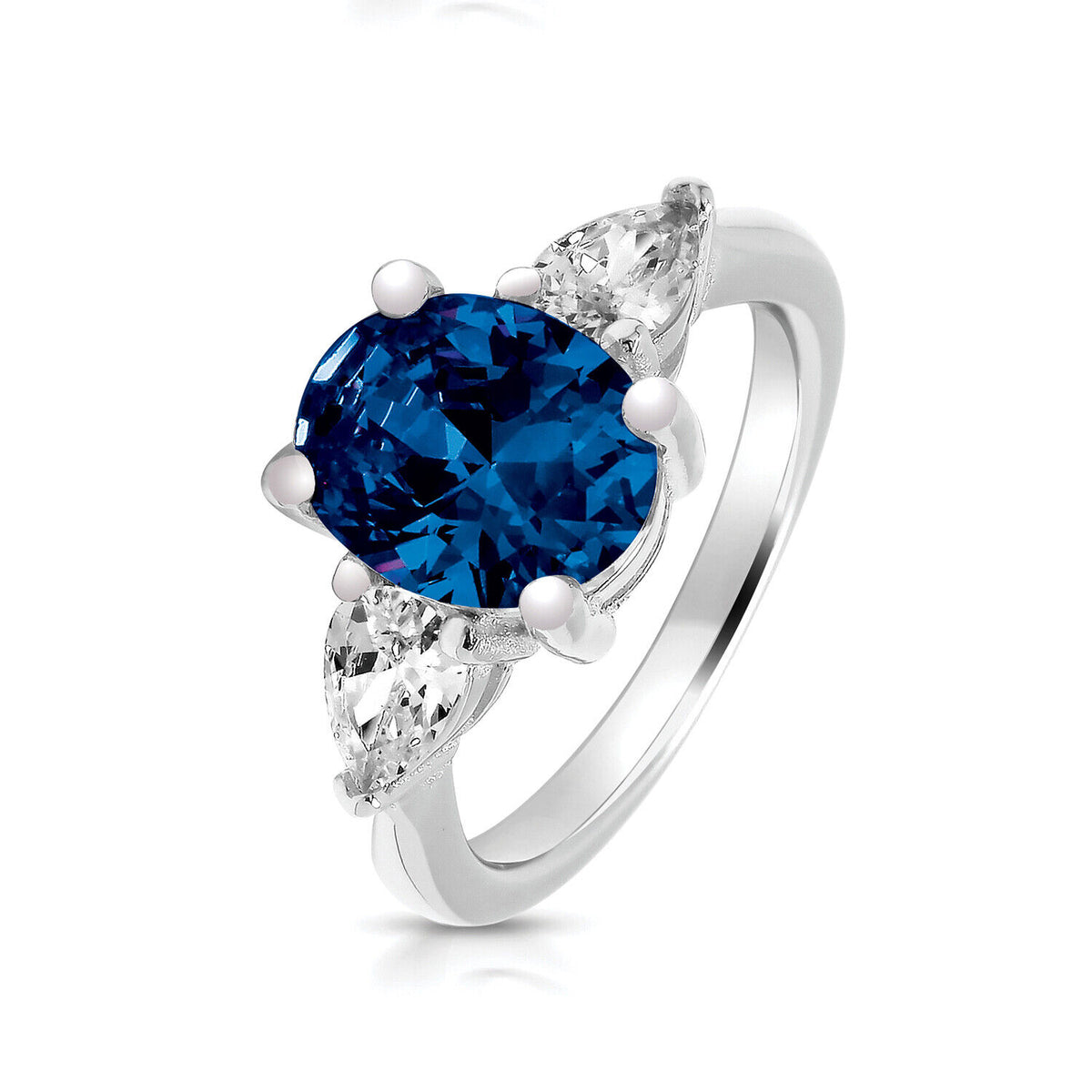 Sterling Silver Sapphire Trilogy Ring with a central blue sapphire and two side diamonds