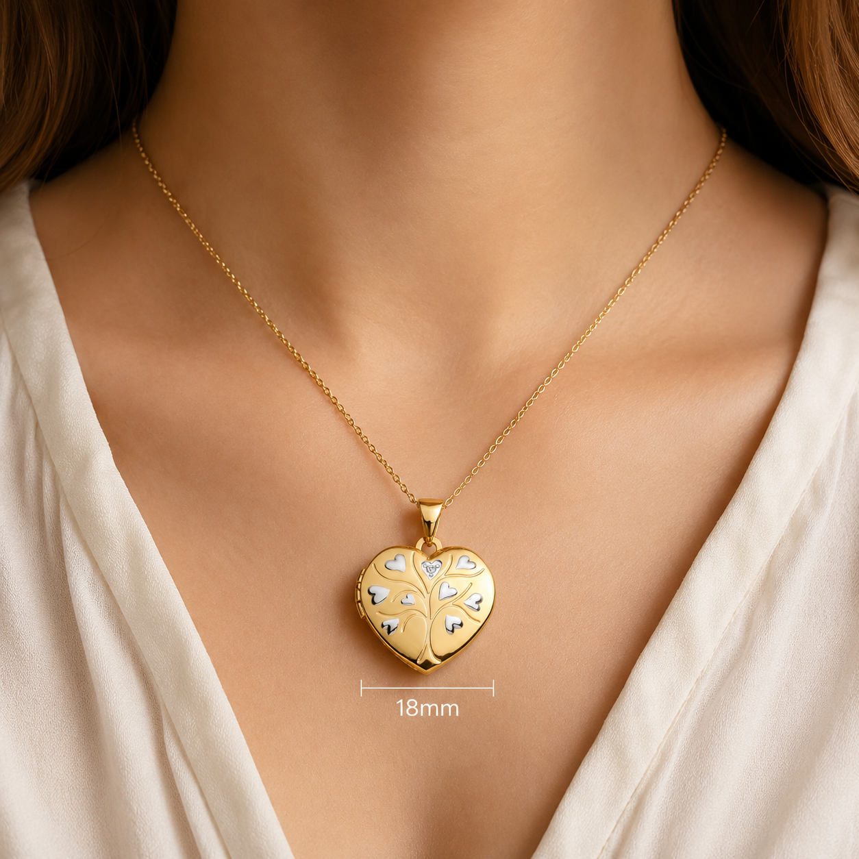 Elegant silver Tree Of Life Locket on a gold chain, measuring 18mm, perfect for meaningful gifts