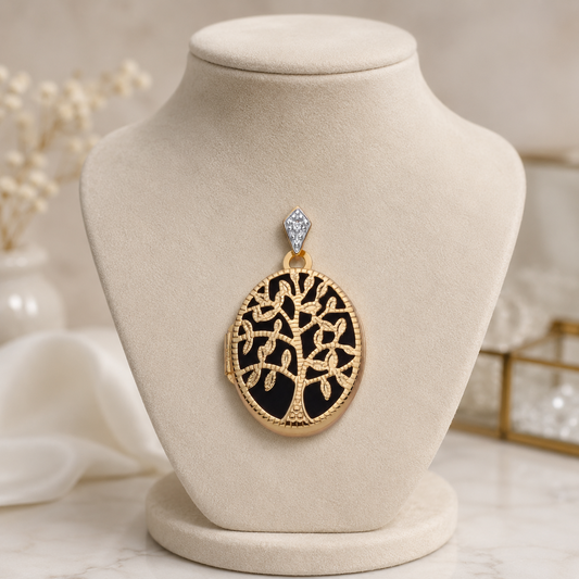 Elegant Tree Of Life Locket in gold and black displayed on a jewellery stand