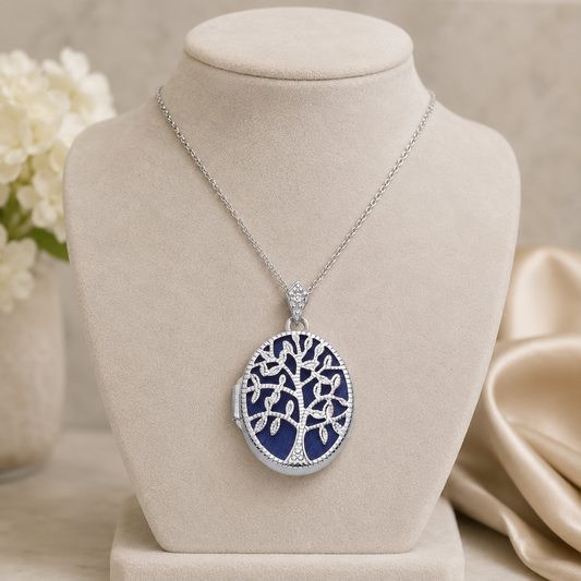 Silver Tree Of Life Locket with intricate design on a display stand